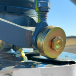 Washers on swashplate pitch link attachment hitting mast cowling