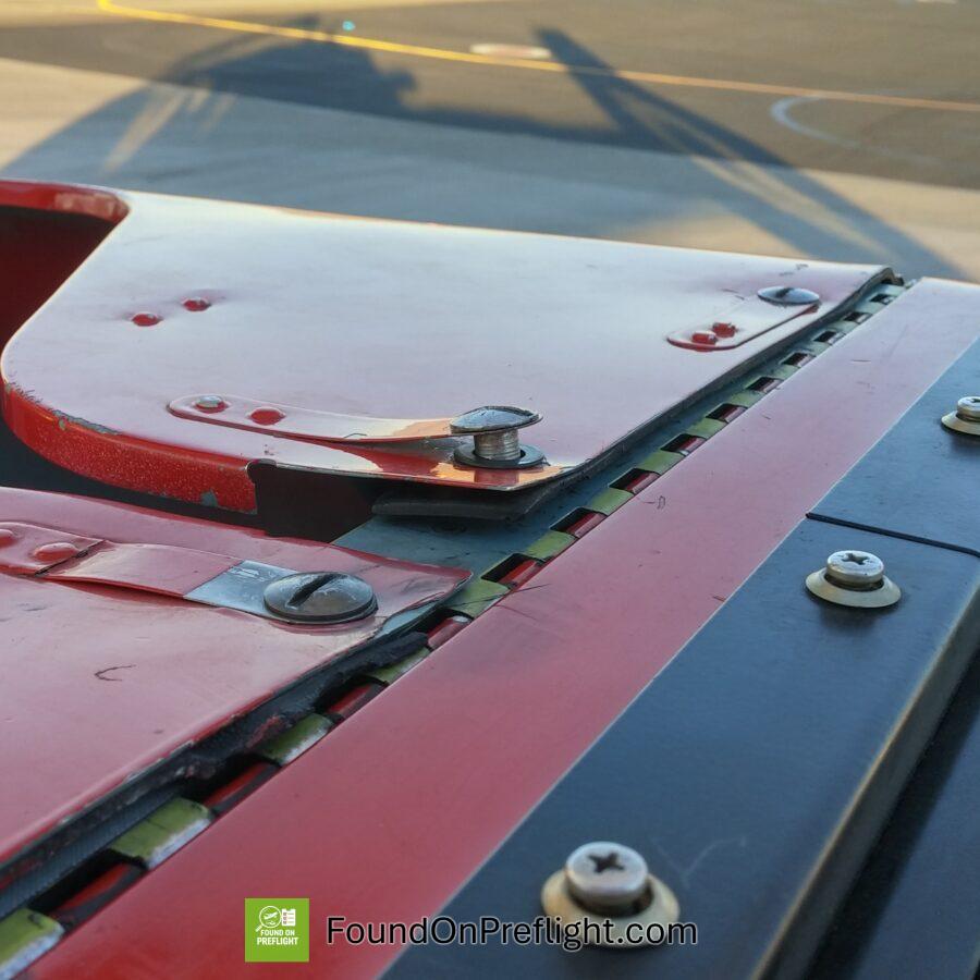 EC130 unsecured fastener on top of cowling near main rotor mast