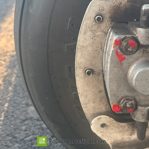 Torque stripes broken on brake bolt heads