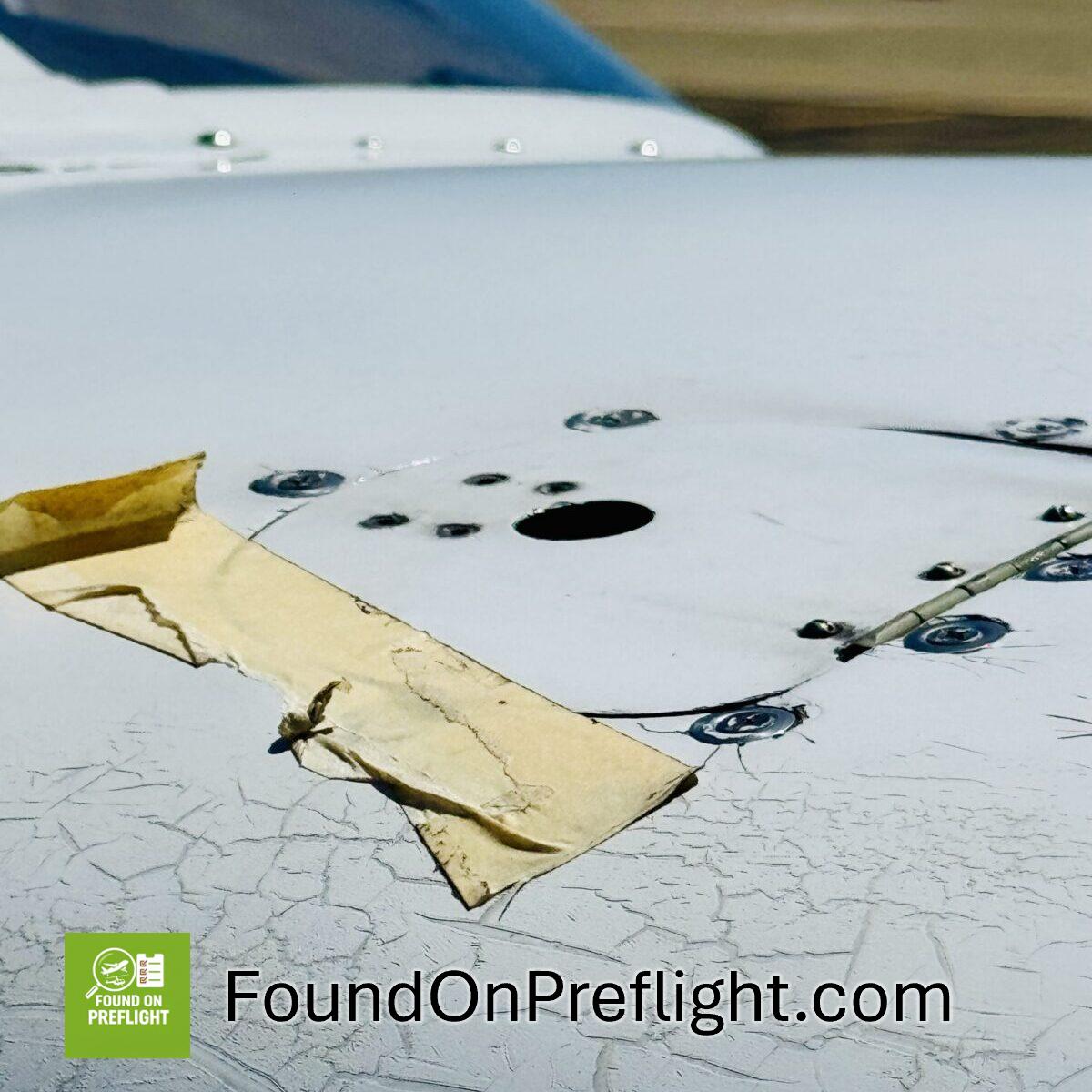 Piper PA-28 – Inspection Hatch Held by Masking Tape
