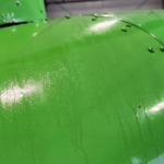 R44 main rotor bearing boot leaked all over fuselage