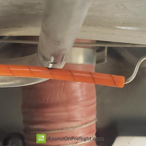 R22 - Oil line cut by wire vibrating against it, even with plastic guard