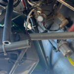 R22 broken steel frame tube near battery