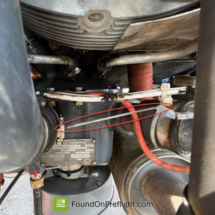 The wire that secures the cooling metal close to the sides and underneath of the cylinders broke