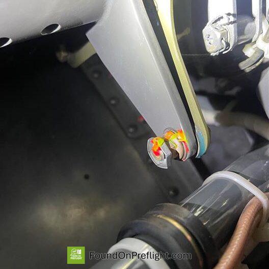 R22 Yoke hardware shows slight rotation and break of torque stripe continuity