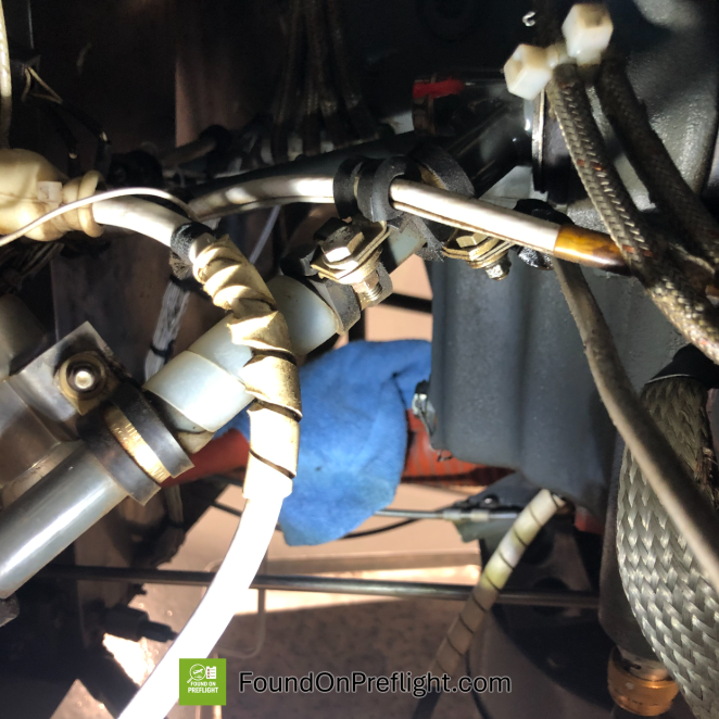 R22 - oil rag found in engine area after maintenance performed