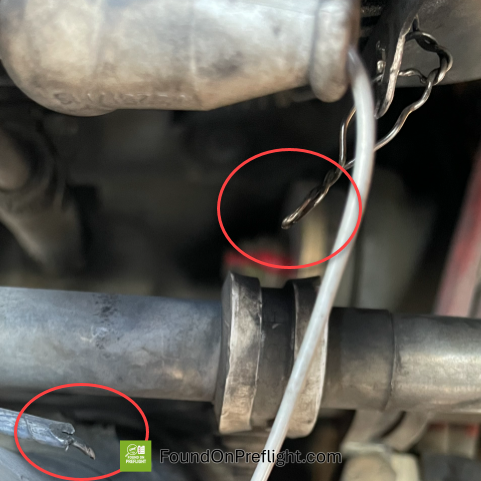 R22 snapped wire securing engine cooling sheet metal