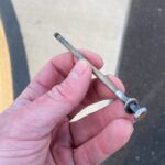 Bolt from an R44 oil cooler found on helipad